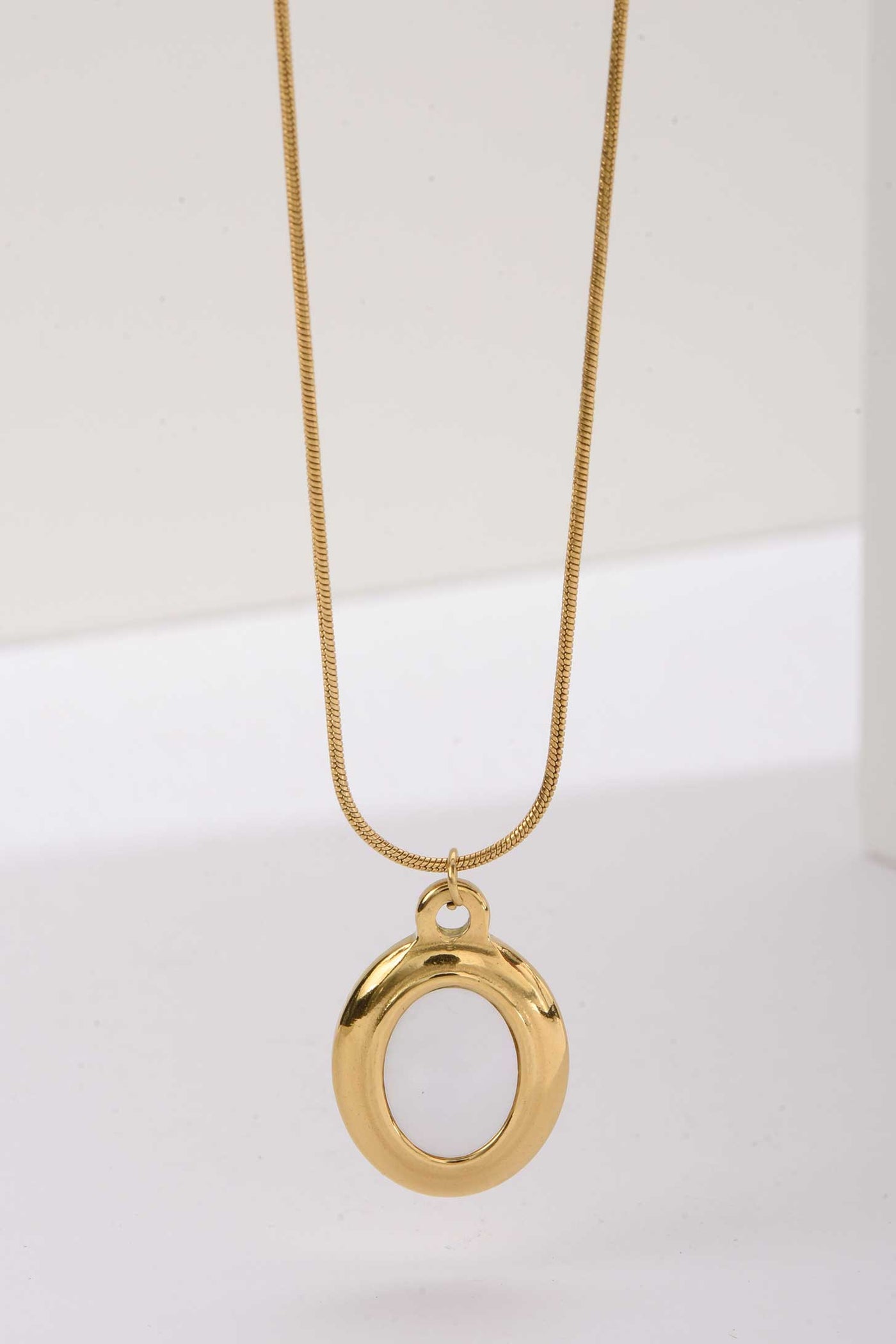 Stainless Steel Necklace | Gold Rounded Oval Pendant with Enamel Inlay Accessories Accessories - Cizaro Jeans