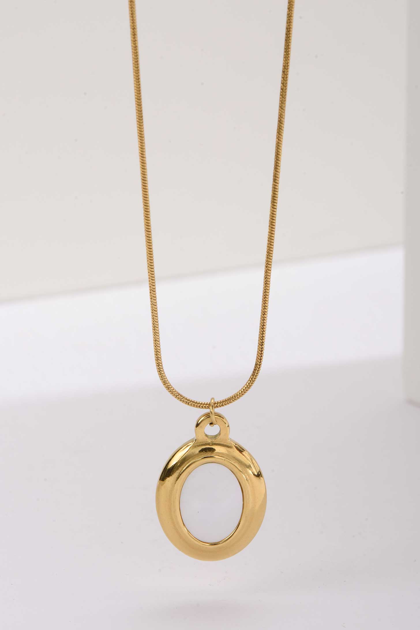 Stainless Steel Necklace | Gold Rounded Oval Pendant with Enamel Inlay Accessories Accessories - Cizaro Jeans
