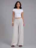 Linen Wide-Leg Pleated Trousers – Natural Beige