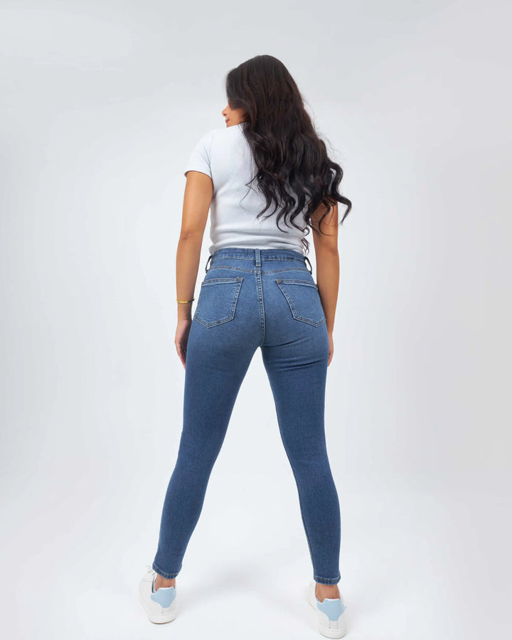 High-Waist Medium Wash Two-Tone Ripped Skinny Jeans.